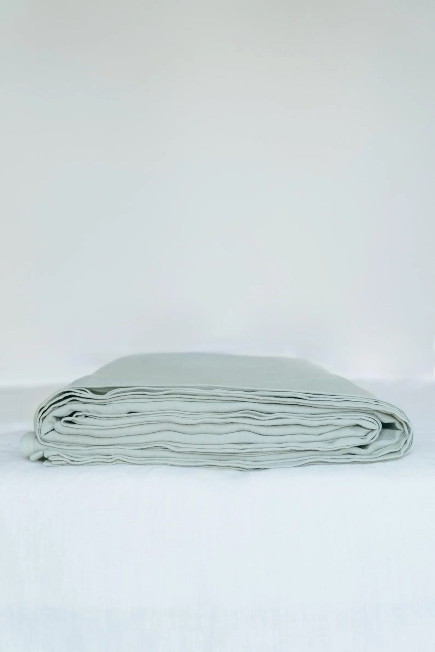 Linen flat sheet in Terracotta. Linen bedspread